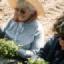 mother + i on an old potato planter planting tomato, trying to make a go when the bank of elroy ecological whores didn't stand behing their word, then their weasel of a lawyer working for tommy thompson in Wi, detained us in a 5 yr law suit. yet many folks let him not just practive a law firm but put him in government. thank you mother, what a beautiful smile as we share the joy of farming together, didn't mean to work you so hard. we never expected people to be so manipulative, as the bankers said after the sale - don't go to the state they'll shut ya down + they did because the bank said they sold us a business that had a good sewer system, when yet the state said no good, have to replace. so all our plans went down with our bank account, + we rethought + went on. but folks whores truly get in the way of being with your loved ones which was the original intent, for dad being ill + mom. this was a wrong move` for us as we worked to move on...